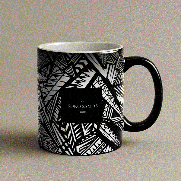 LimaLuxe™ heat reactive 11oz mug, showing a design that changes with heat, placed on a surface.