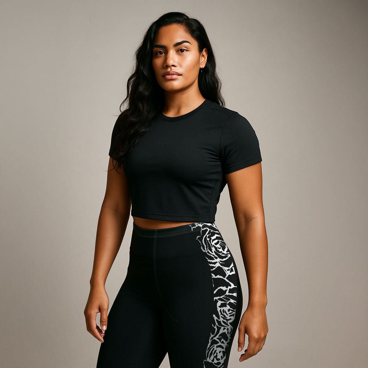 Black FYBY IslandFlex mid-rise leggings with a sleek fit, designed for comfort and style in Faleasiu Nights pattern.