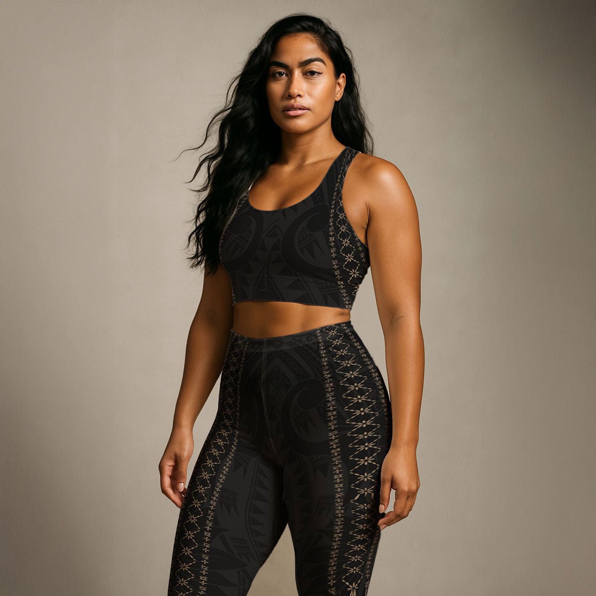 Black seamless sports bra by FYBY, Malu collection, featuring subtle stitching and supportive design for active wear.