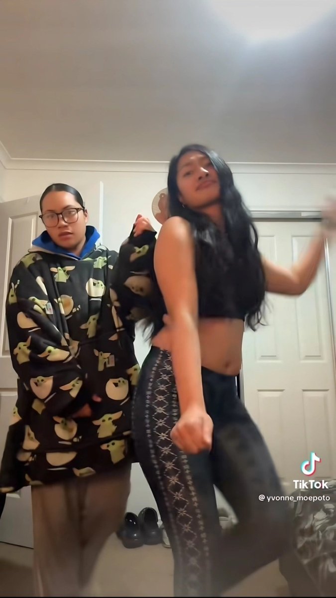 Black seamless sports bra by FYBY, Malu collection, with subtle stitching, designed for active wear in AU, NZ, and USA.