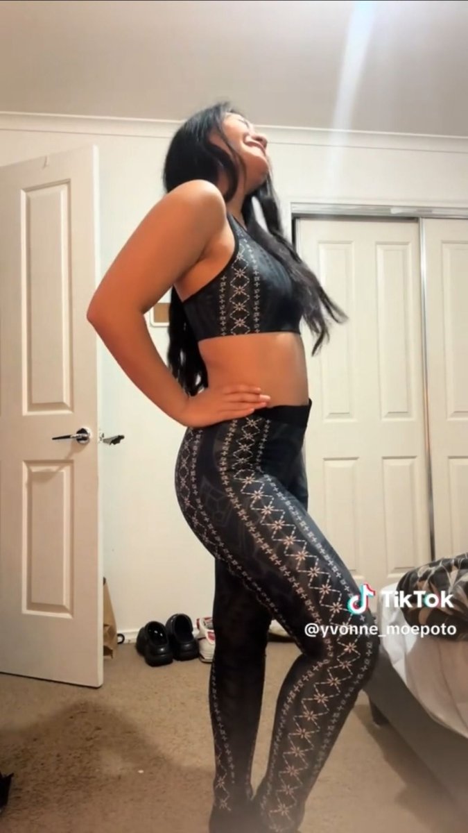 Black seamless sports bra by FYBY with subtle stitching, designed for comfort and support during workouts.