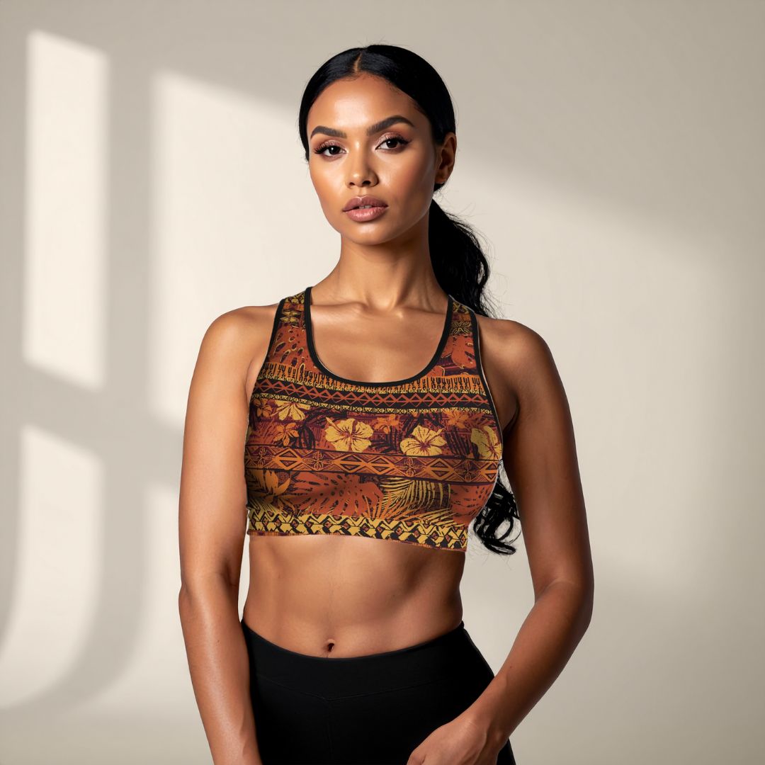 Black seamless sports bra by FYBY with subtle stitching, designed for comfort and support during active wear.
