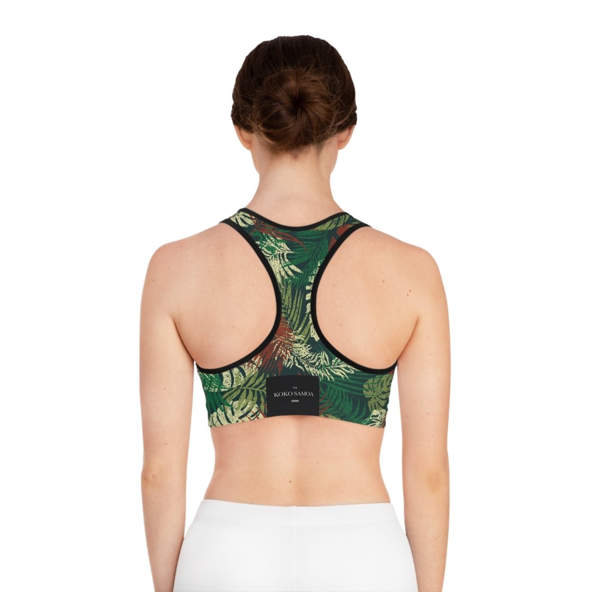 Seamless sports bra by FYBY in Tafatafa Greens with black stitching, designed for active wear, shown on a plain background.