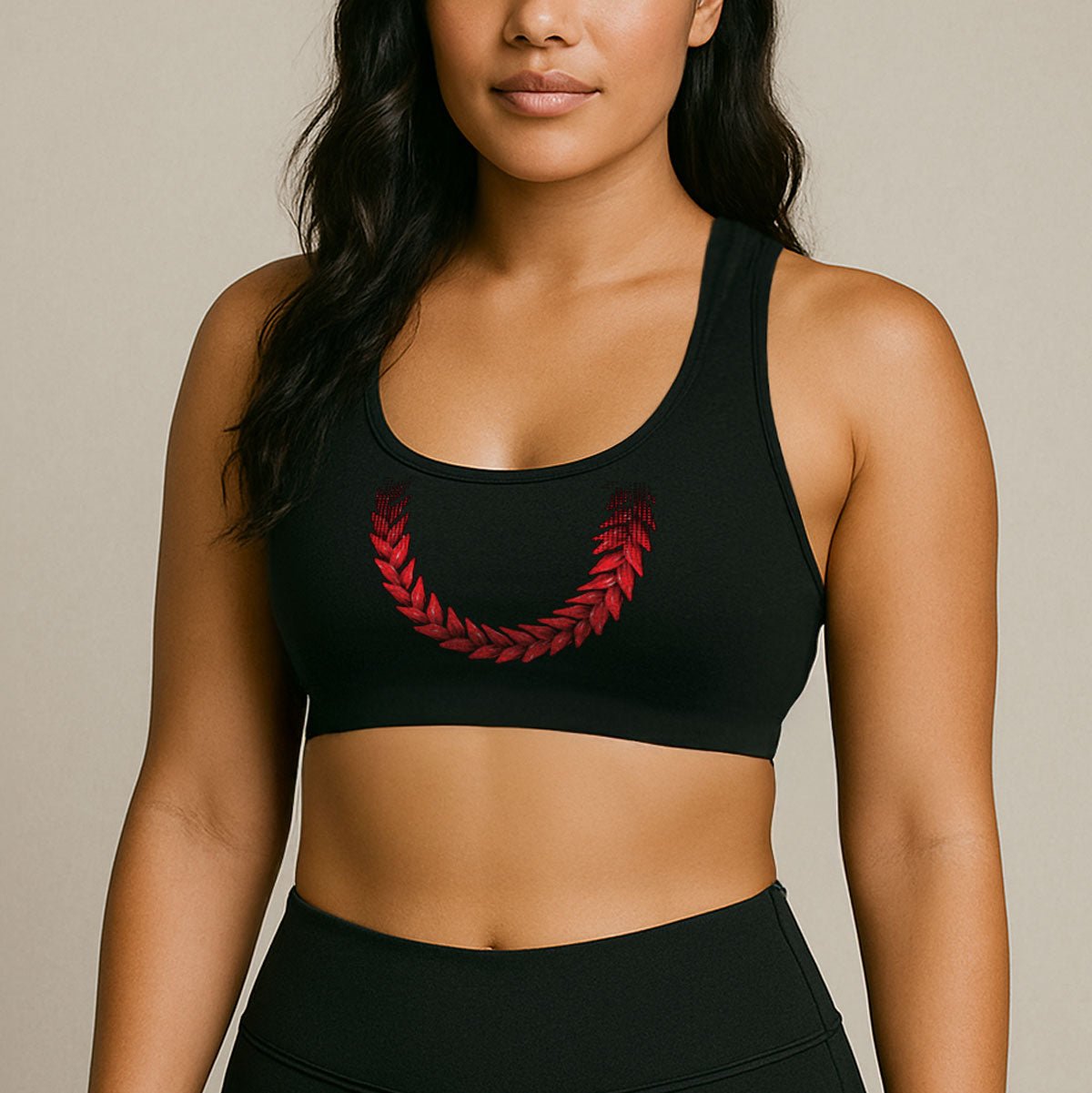 Black seamless sports bra by FYBY with stitching detail, ideal for active wear from the Ula Fala collection.