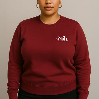 Black Inkblot Champion unisex sweatshirt with a classic fit, shown laid flat with a crew neckline and long sleeves.