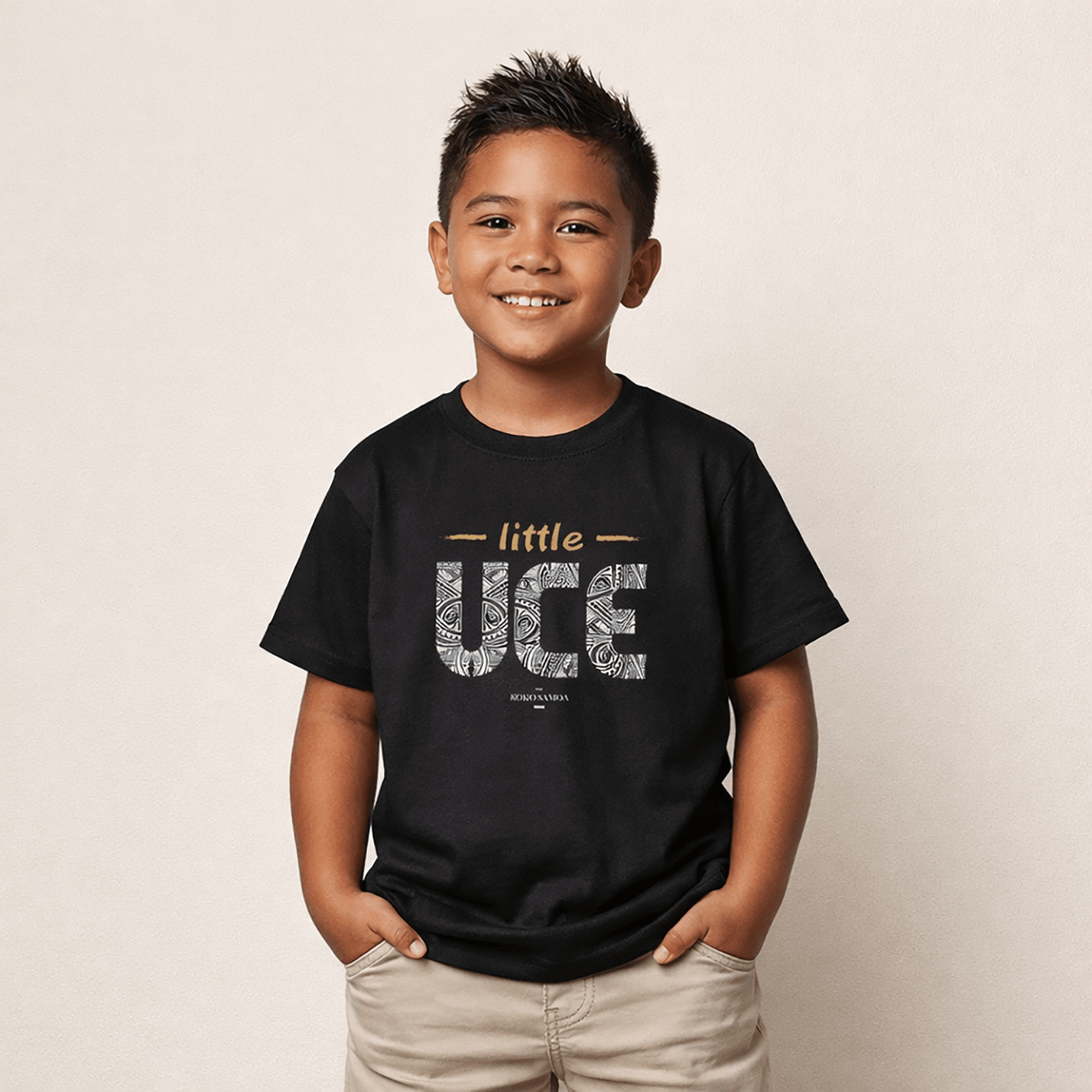 Kids unisex Little Uce T-shirt from The Print Bar, featuring colorful tropical print, casual kids' clothing for boys and girls.