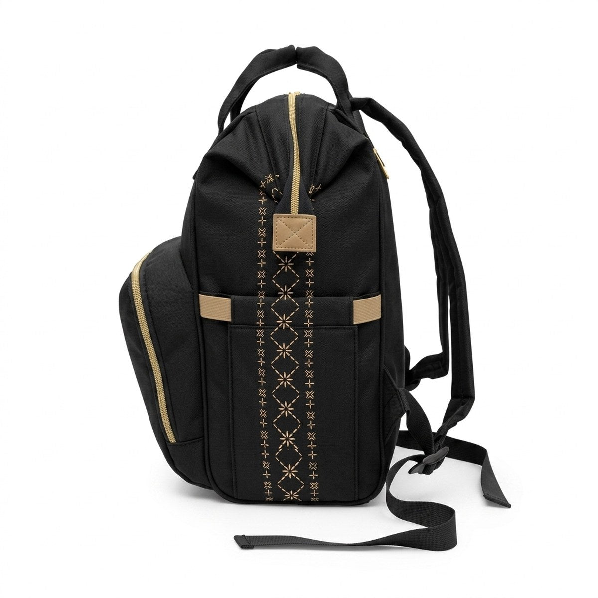 Malu diaper bag, side profile on white, showing gold tatau stripe and side pocket