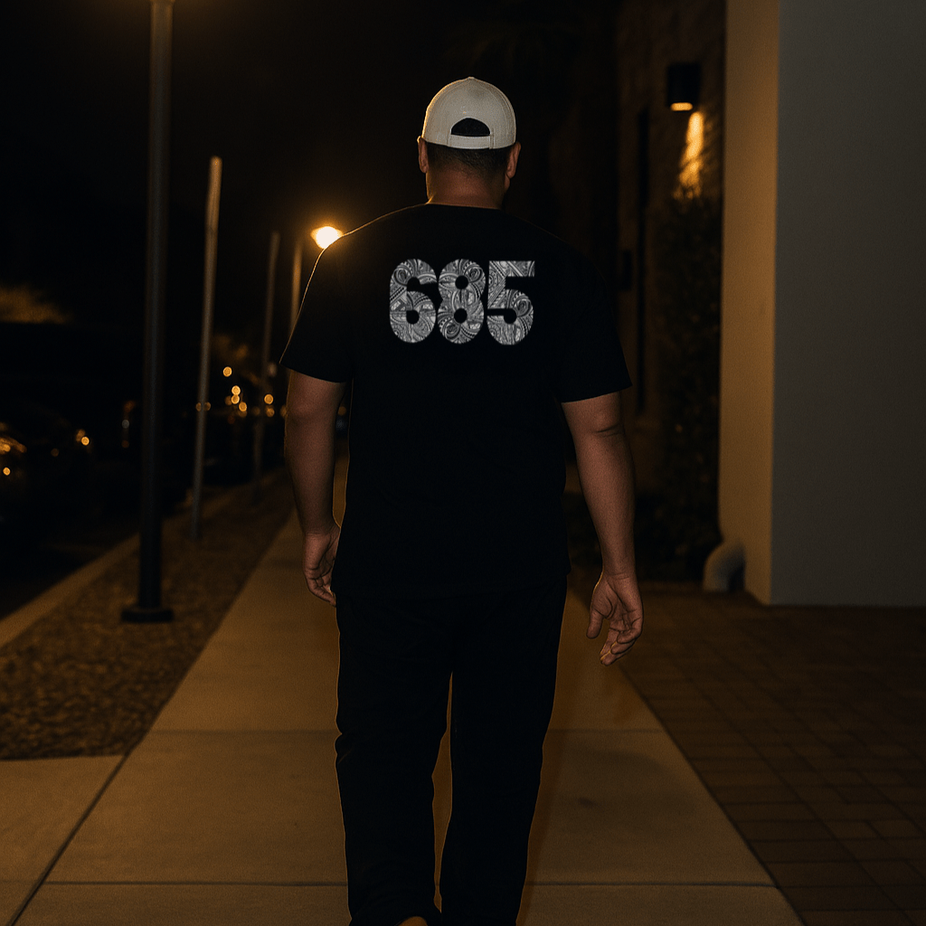 Black unisex soft tee by The Print Bar featuring a monster digital print, casual and comfortable T-shirt for all genders.