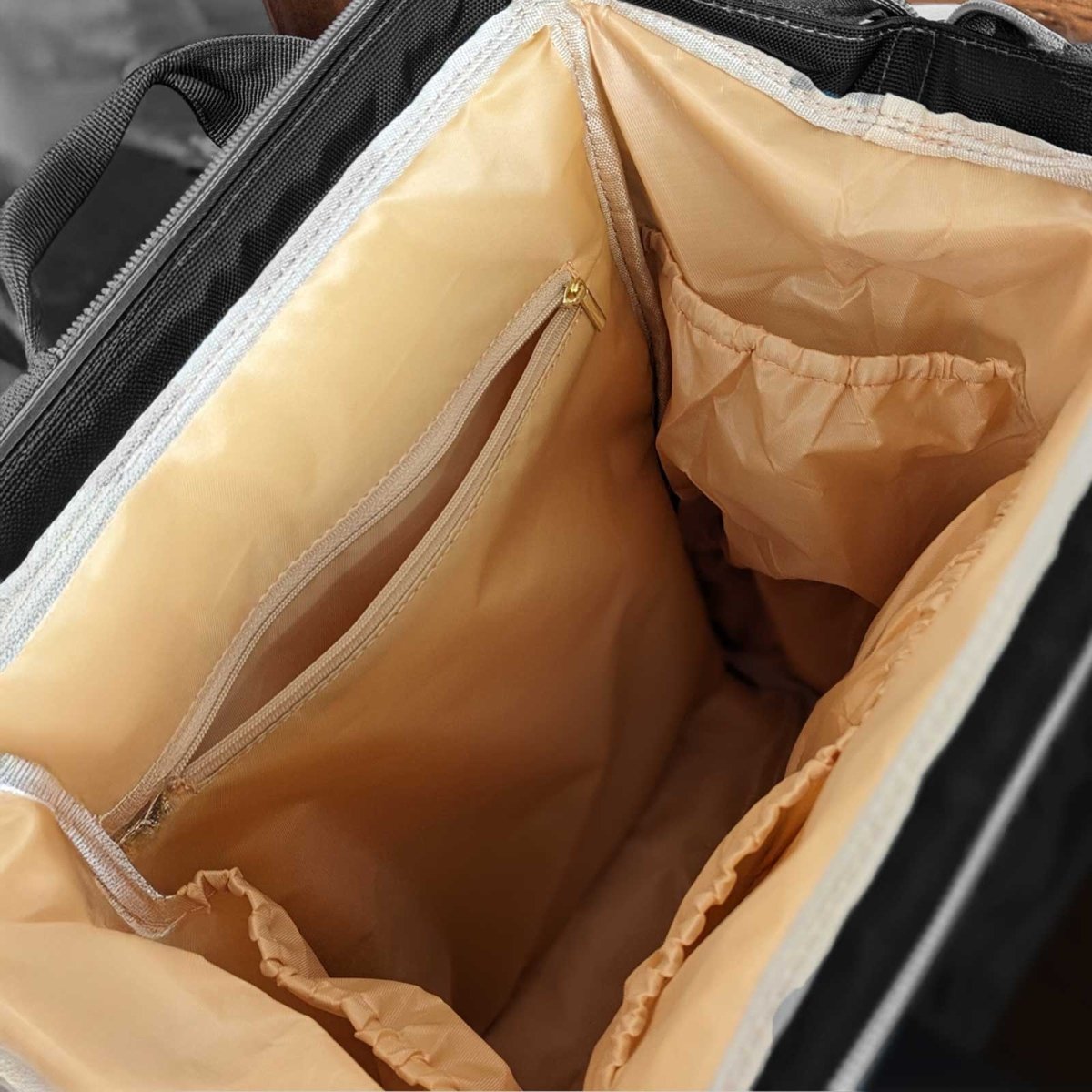 Artsadd Malu multipurpose diaper bag with multiple compartments and stylish design, ideal for parents on the go.