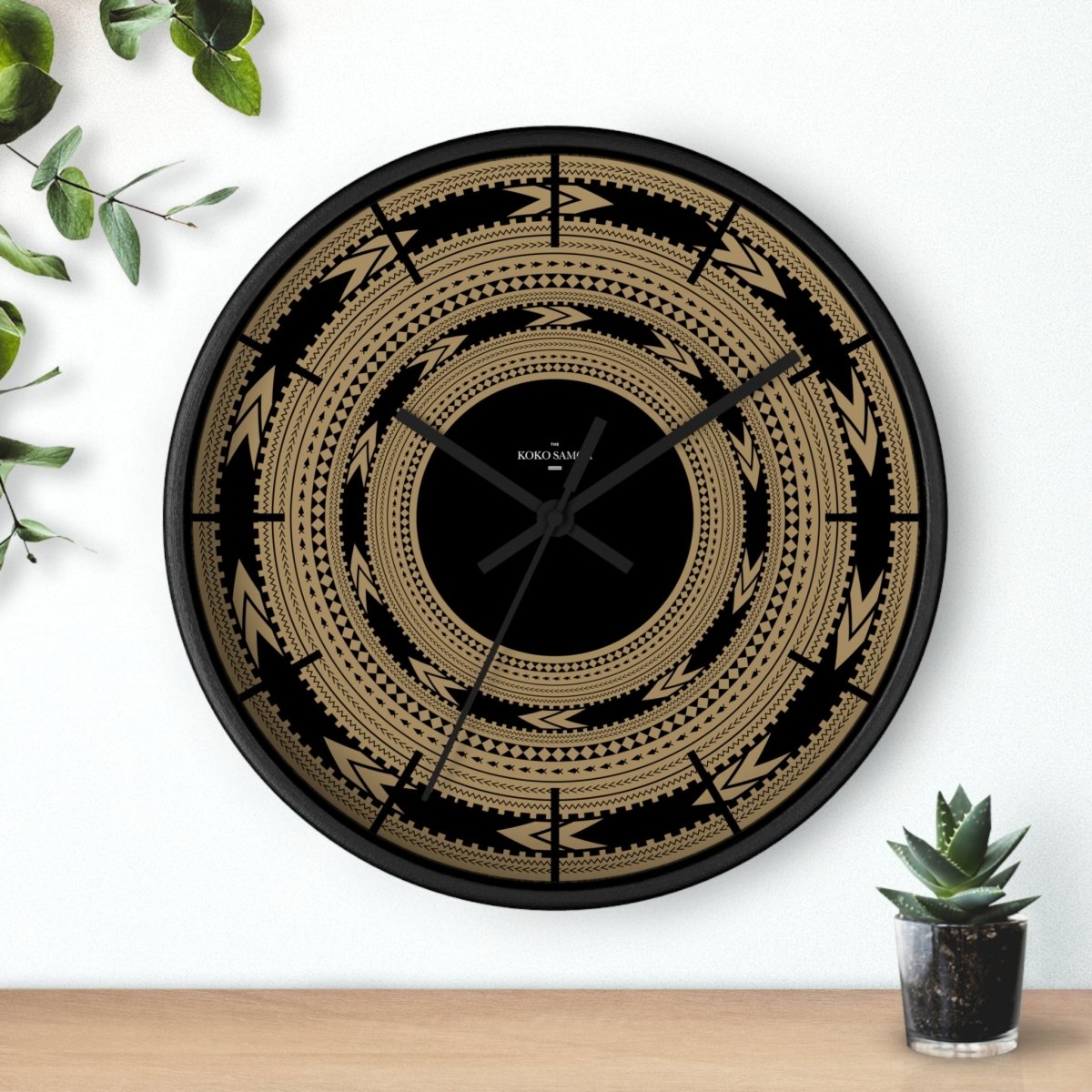 Black 10-inch wall clock with Pe'a design, suitable for AU, NZ, and USA home decor, featuring a sleek modern style.