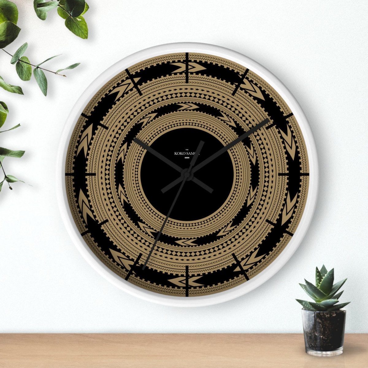 Black 10-inch Pe'a wall clock, home decor with modern design, suitable for AU, NZ, and US styles.