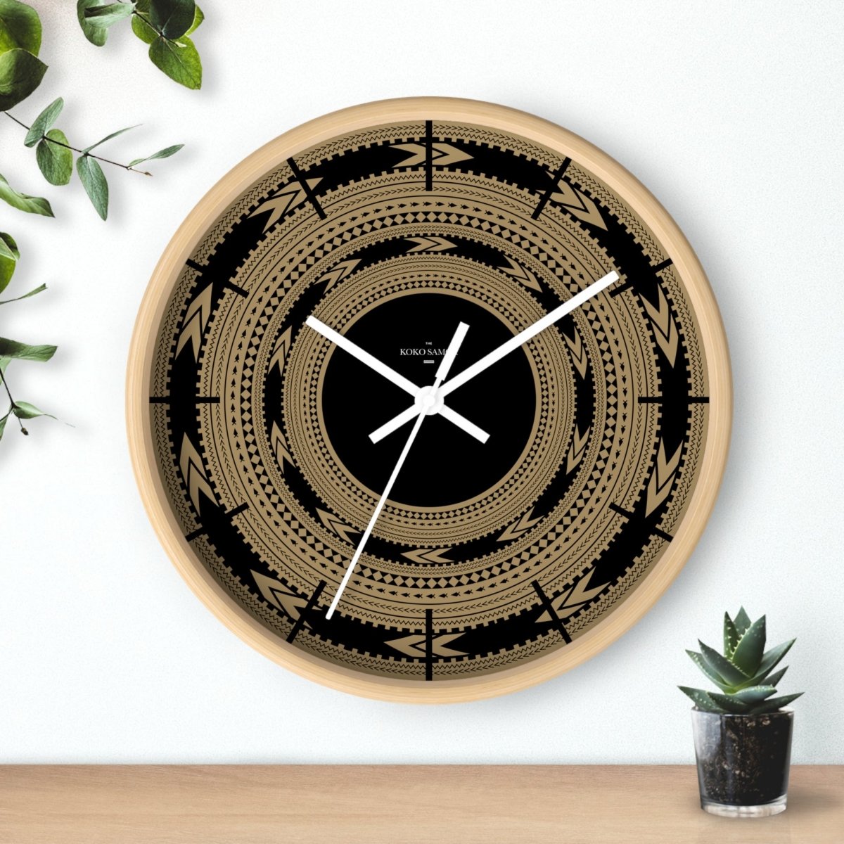Black 10-inch wall clock with Pe'a design, perfect for home decor in AU, NZ, and USA.