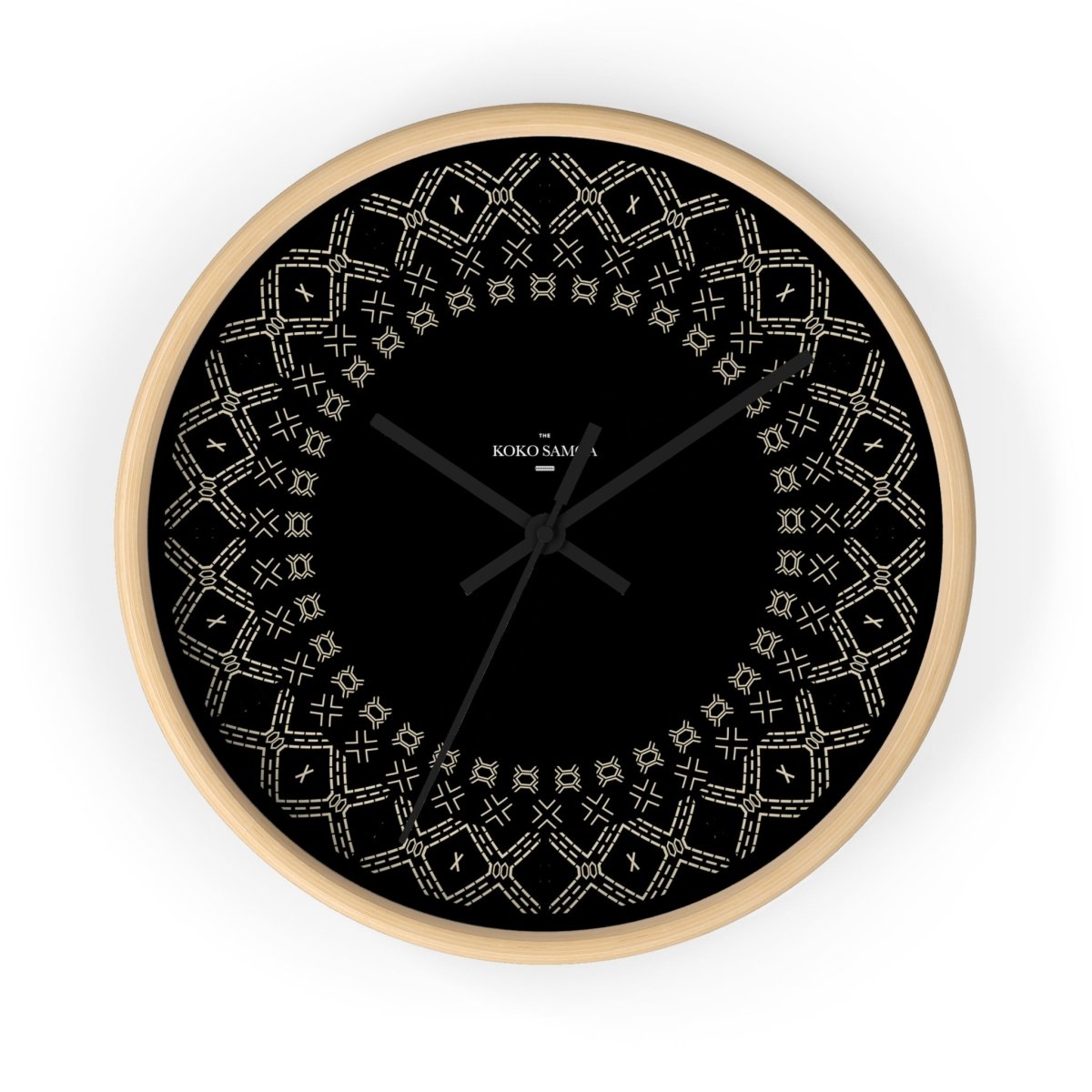 Black 10-inch wall clock from Malu, featuring a modern home decor design with white clock face and black base.