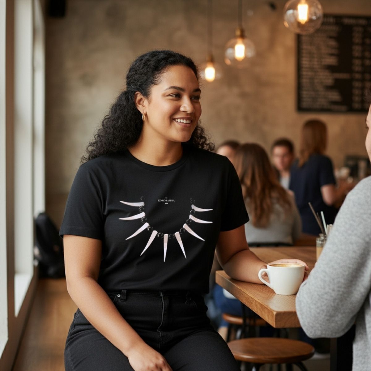 Black unisex heavy tee by Monster Digital featuring Ula Nifo print, made in the USA, casual and durable men's and women's shirt.