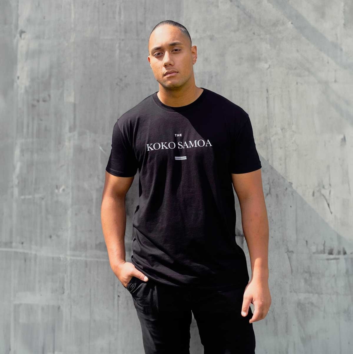 Black soft unisex T-shirt from The Brand Classic, featuring a comfortable fit and simple design.