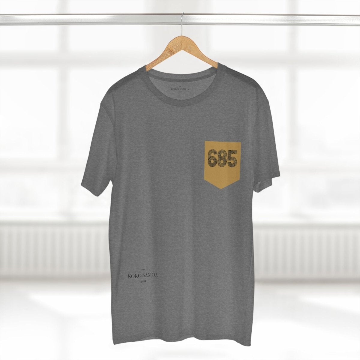 Unisex soft army green tee by The Print Bar with '685 Pocket' print, featuring a casual fit and short sleeves.