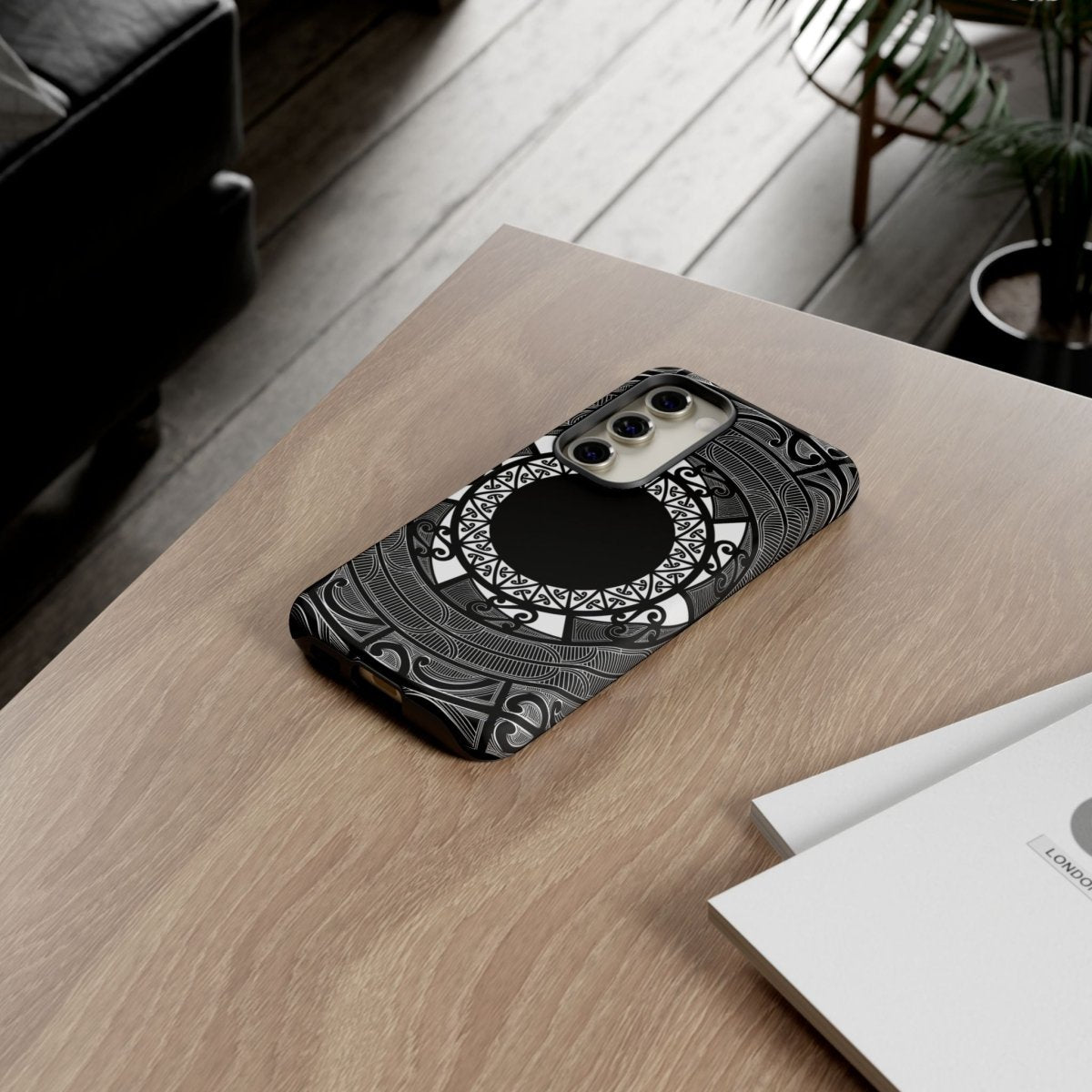 WOYC tough Māori phone case with traditional Koko Samoa design, fits phones in AU, NZ, and USA regions.